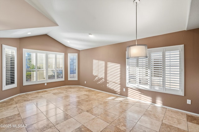 9797 E Holden Pl, Tucson, AZ 85748 - unfurnished room featuring lofted ceiling and tile patterned flooring