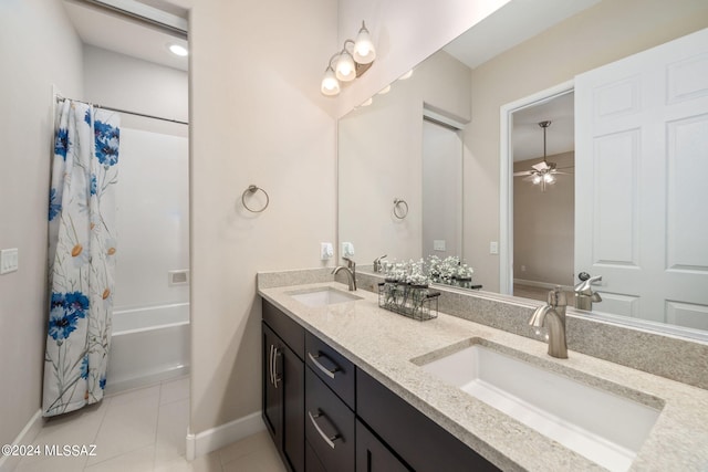 bathroom with shower / bath combo, tile patterned flooring, vanity, and ceiling fan