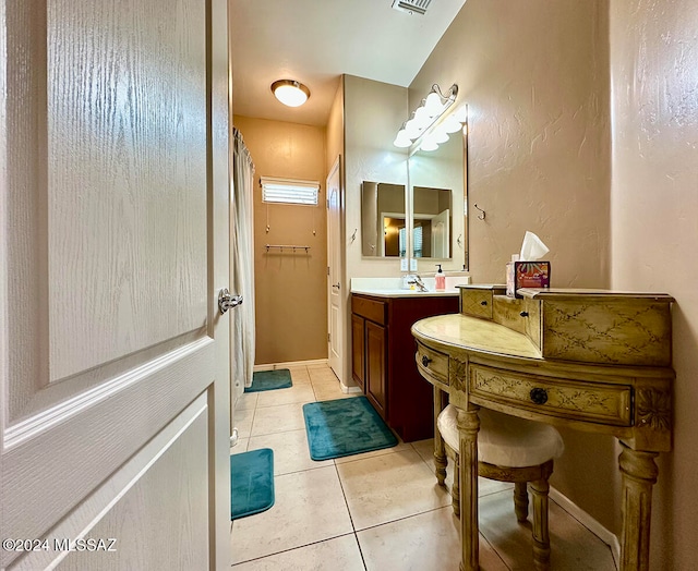 bathroom with vanity and tile patterned floors