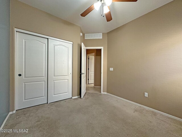 bedroom with light tile patterned flooring and a closet