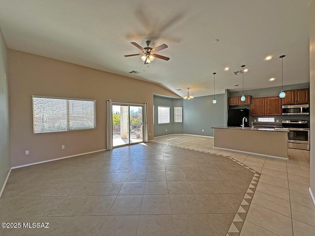 unfurnished living room with light tile patterned floors, visible vents, baseboards, a ceiling fan, and vaulted ceiling