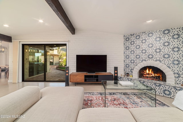 living room with a fireplace and vaulted ceiling with beams