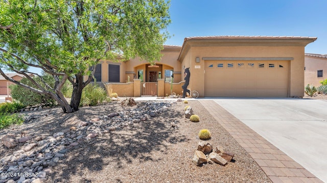 view of front of property featuring a garage