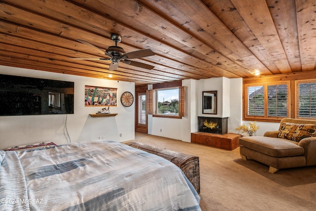 carpeted bedroom featuring ceiling fan and wooden ceiling