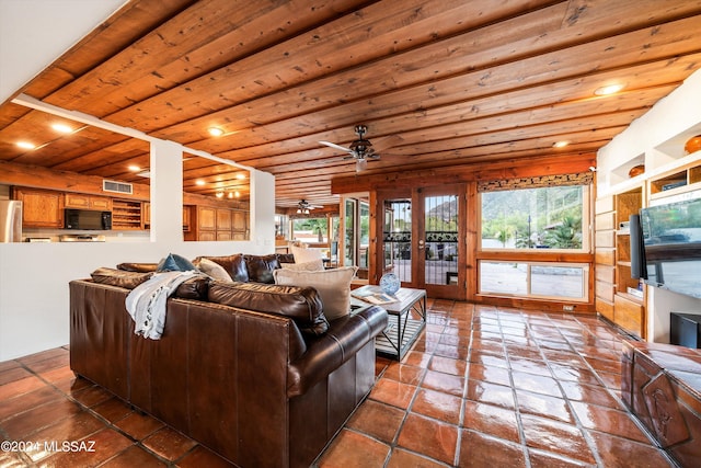 tiled living room featuring wooden ceiling, a wealth of natural light, and ceiling fan