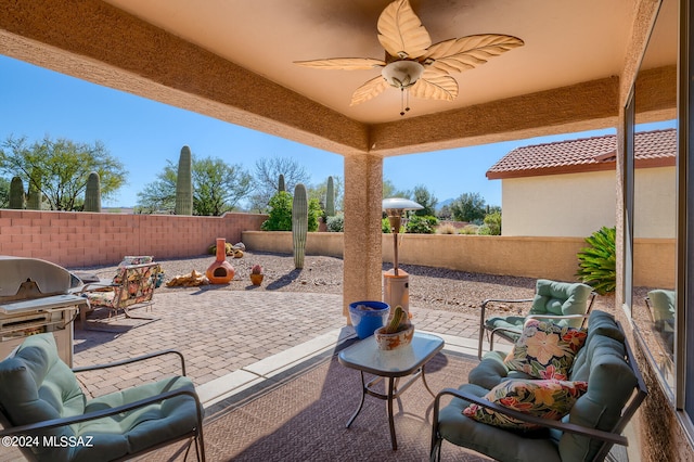 view of patio with ceiling fan