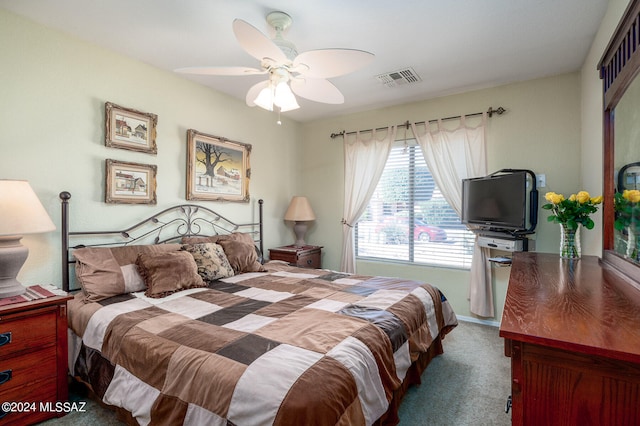 carpeted bedroom with ceiling fan