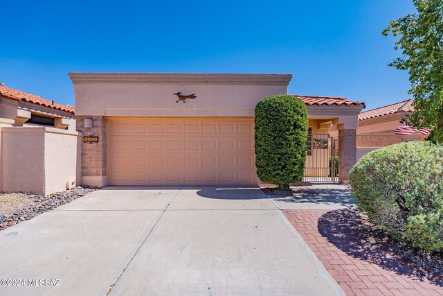 view of front of property featuring a garage