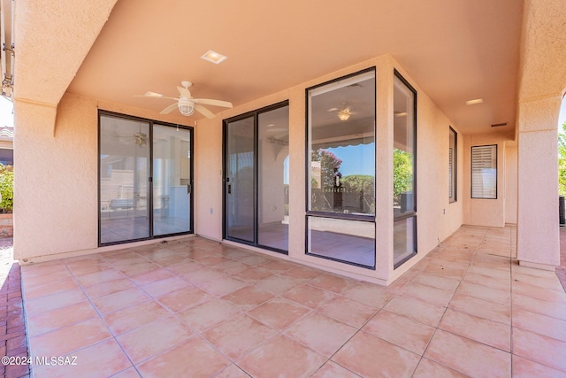 view of patio / terrace featuring ceiling fan