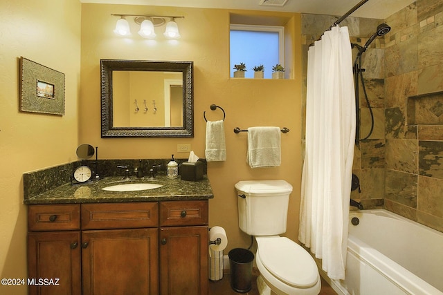 bathroom featuring vanity, shower / tub combo with curtain, visible vents, and toilet