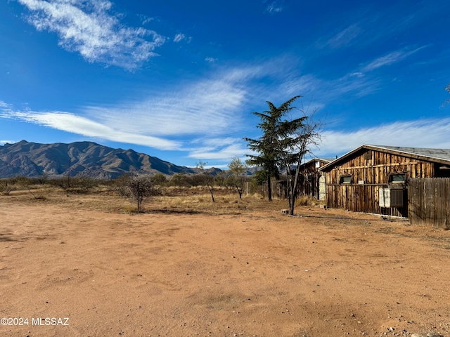 property view of mountains featuring a rural view