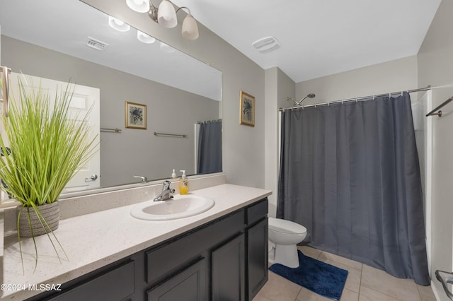 6524 S Diablo Dr, Tucson, AZ 85757 - full bathroom with tile patterned flooring, visible vents, vanity, and toilet