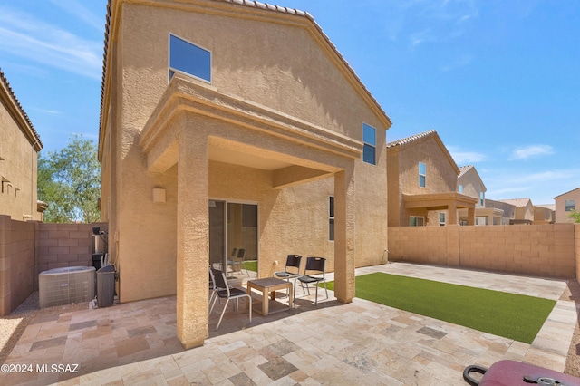 6524 S Diablo Dr, Tucson, AZ 85757 - rear view of property featuring stucco siding, a fenced backyard, and a patio