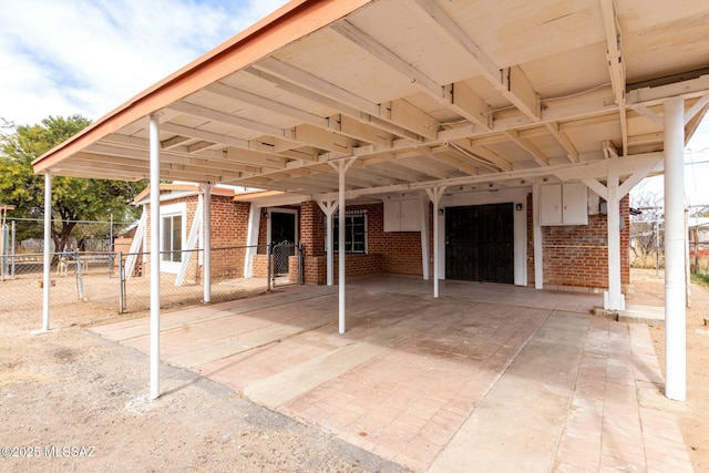 view of patio featuring a carport