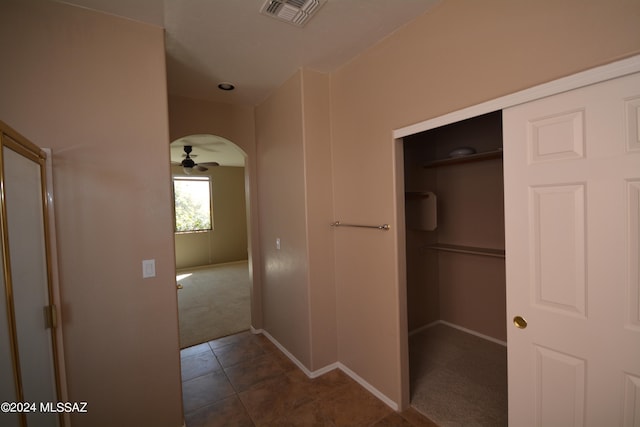 corridor featuring carpet floors