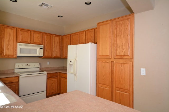kitchen featuring white appliances