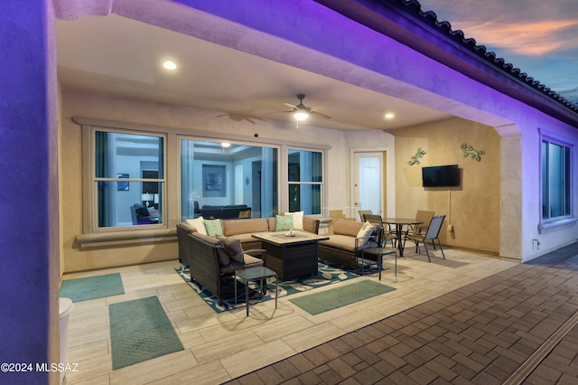 view of patio / terrace with ceiling fan and outdoor lounge area