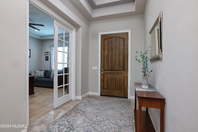 foyer entrance with baseboards