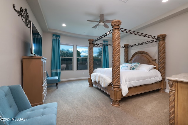 bedroom with recessed lighting, light colored carpet, baseboards, and ceiling fan