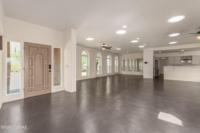 interior space featuring recessed lighting and ceiling fan