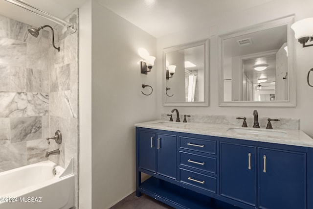 full bath featuring shower / washtub combination, visible vents, a sink, and double vanity