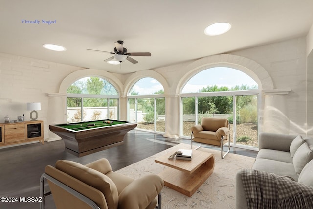 recreation room with ceiling fan, billiards, and a wealth of natural light