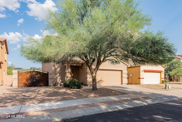 view of front of property with a garage