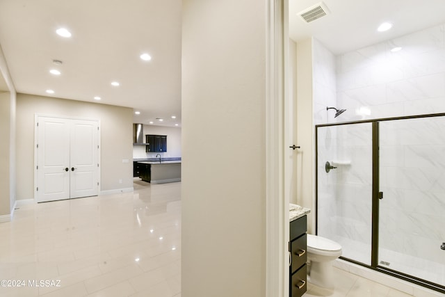 full bath featuring a stall shower, visible vents, vanity, and toilet