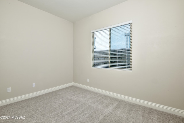 empty room featuring carpet floors