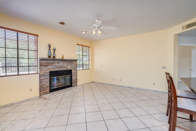 spare room featuring ceiling fan and light hardwood / wood-style flooring