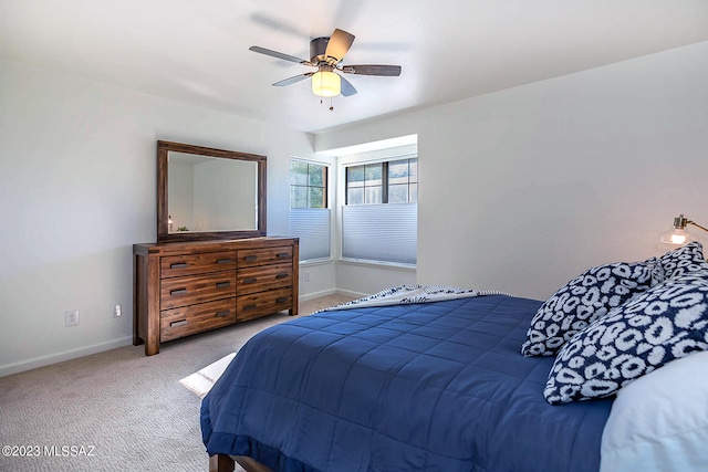 bedroom featuring ceiling fan and carpet floors