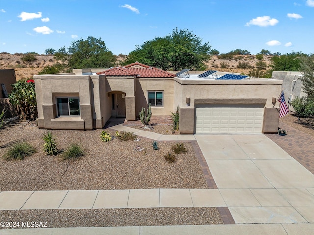 view of front of house featuring a garage