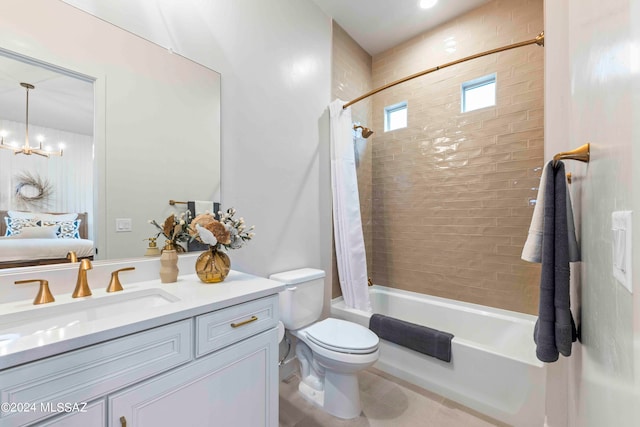 full bathroom featuring vanity, toilet, a chandelier, and shower / bath combination with curtain