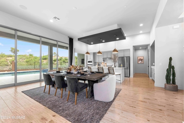 dining room featuring light hardwood / wood-style flooring