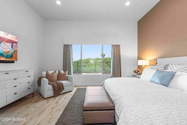 bedroom with light hardwood / wood-style floors