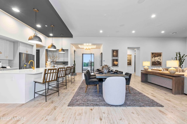 living room with light hardwood / wood-style floors