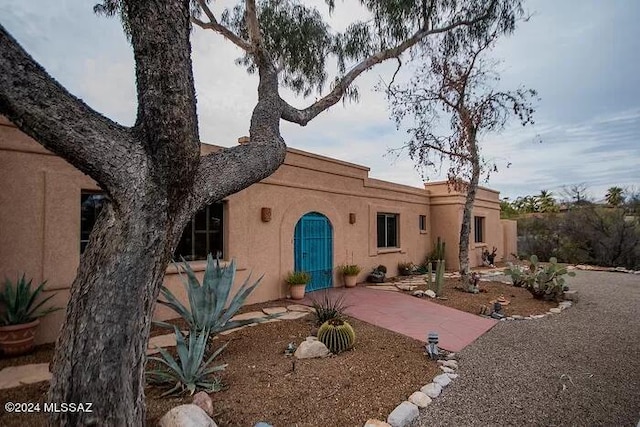 view of front of house with a patio