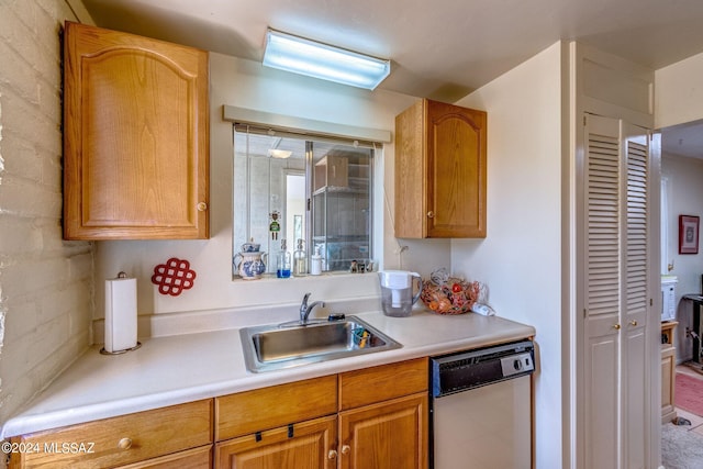 kitchen featuring sink and dishwasher