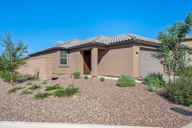 exterior space with a garage