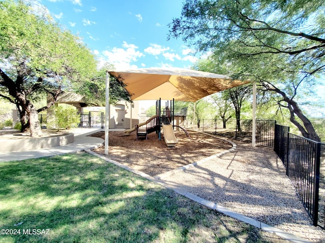 view of playground with a yard