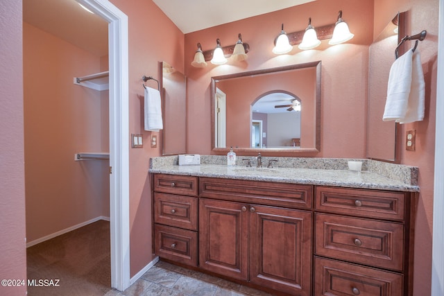 bathroom with vanity and ceiling fan