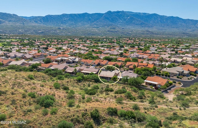 drone / aerial view featuring a mountain view