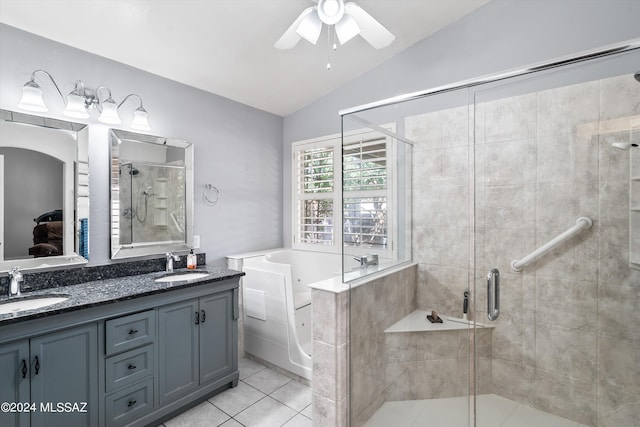 bathroom with vanity, plus walk in shower, vaulted ceiling, tile patterned flooring, and ceiling fan