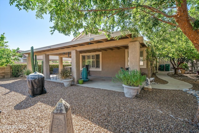 back of house featuring a patio