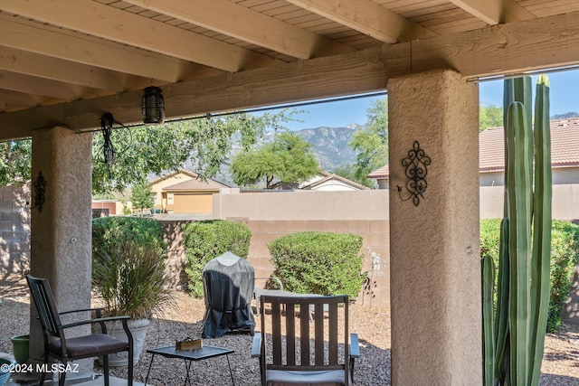 view of patio featuring a mountain view and area for grilling