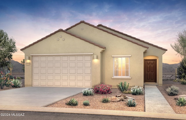 view of front of home featuring a garage