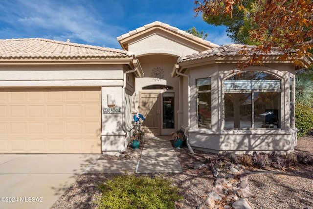 view of front of home featuring a garage