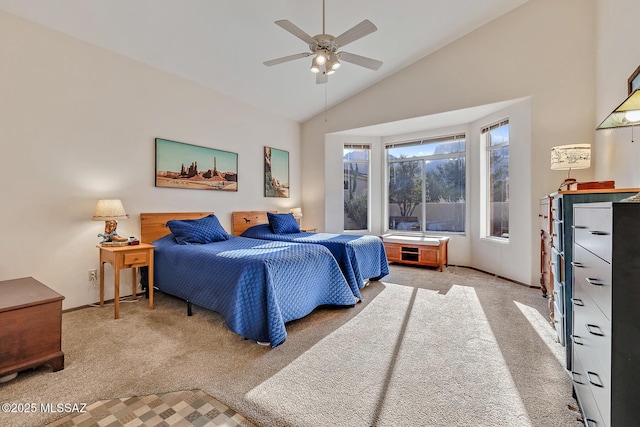 carpeted bedroom featuring high vaulted ceiling and ceiling fan