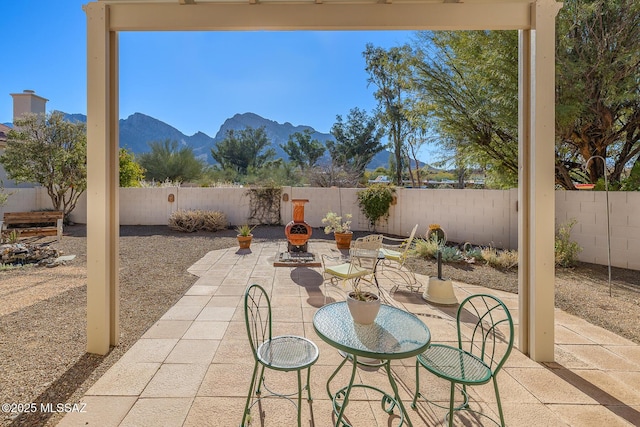 view of patio featuring a mountain view