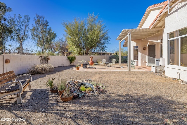 view of yard with a patio, an outdoor fire pit, and a pergola